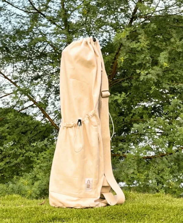 Adjustable strap bottle holder for hands-free water carrying